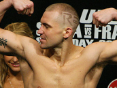 Knee Bar Escape to Arm Triangle Transition with Alan Belcher